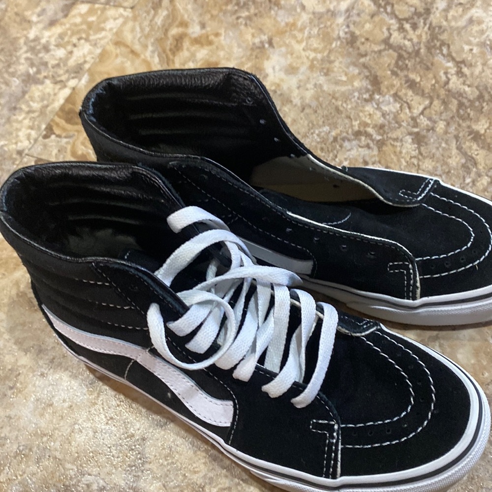 Vans size 5 new without tags and one shoe string. No idea where he put it.